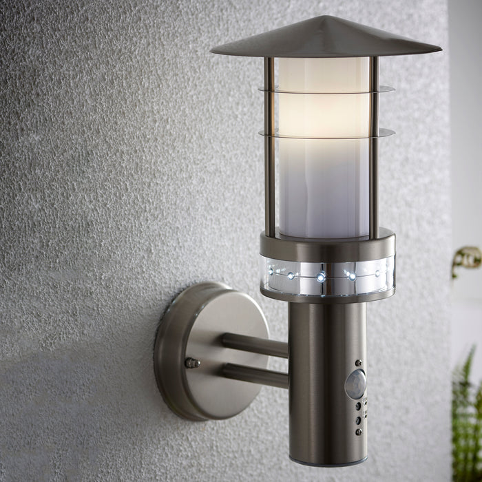 Saxby 13924 Pagoda PIR 1lt wall IP44 9.2W & 0.05W Brushed stainless steel & frosted pc 9.2W LED E27 & 12 x 0.05W LED (Capsule) Cool white (Required) - westbasedirect.com