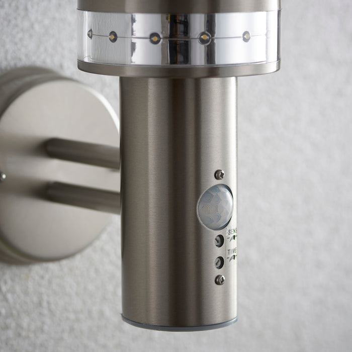 Saxby 13924 Pagoda PIR 1lt wall IP44 9.2W & 0.05W Brushed stainless steel & frosted pc 9.2W LED E27 & 12 x 0.05W LED (Capsule) Cool white (Required) - westbasedirect.com