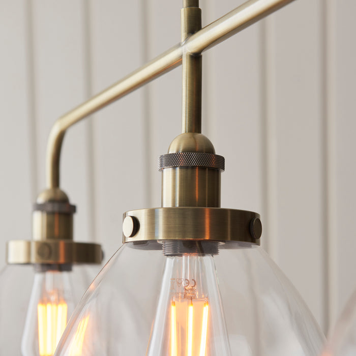 Endon 103014 Hansen 3lt Linear Pendant Antique brass plate & clear glass 3 x 10W LED E27 (Required) - westbasedirect.com