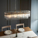 Endon 112573 Marietta 4lt Linear Pendant Antique brass plate & clear glass 4 x 6W LED E14 (Required) - westbasedirect.com