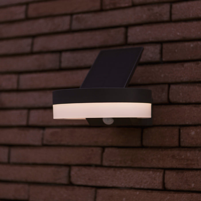 Lutec 6915801335 RUNDA 12W IP54 LED Solar Outdoor Wall Light with PIR 4000K - Dark Grey